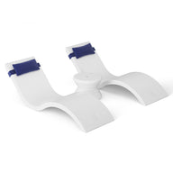The Outdoor Paradise In-Pool Furniture Bundle by Ledge Lounger includes two modern white lounge chairs with wavy designs and blue headrests, creating a serene setting. Featuring smooth curves and a circular table centerpiece, it’s perfect for poolside relaxation as Signature In-Pool Chaise Loungers.
