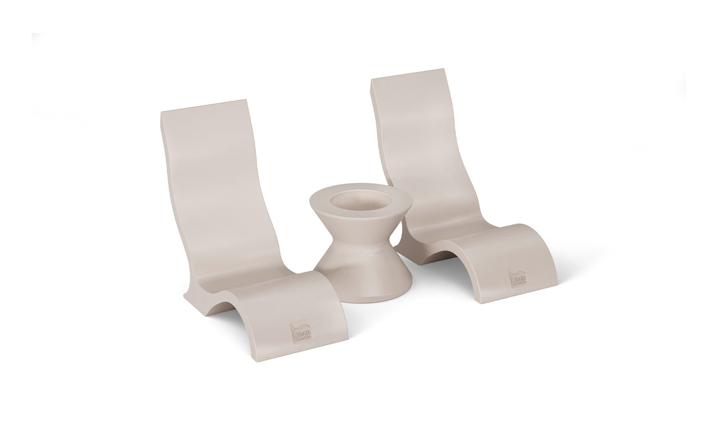 Three Ledge Lounger minimalist beige plastic monitor stands and one matching phone holder with an ergonomic, curved design are set against a white background.