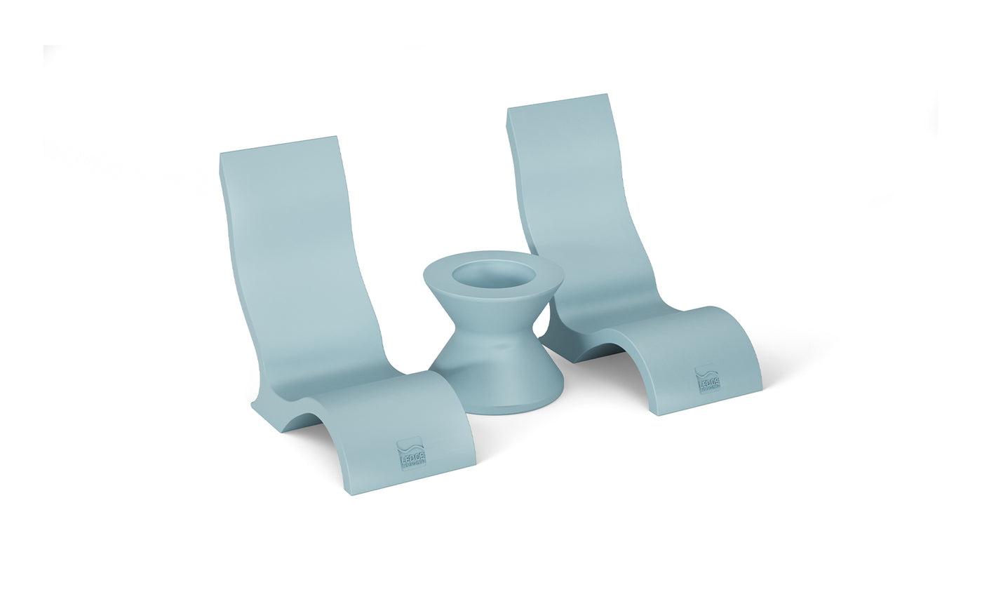 The sky-blue rubber bookends, shaped like bent Ls with an ergonomic hourglass teal slot for a writing tool, complement the Relaxation In-Pool Chair & Ice Bin Bundle by Ledge Lounger.