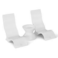 The Ledge Lounger Relaxation In-Pool Chair & Ice Bin Bundle features sleek, ergonomic high-back chairs alongside an hourglass-shaped table, creating a minimalist and modern aesthetic against a white backdrop.