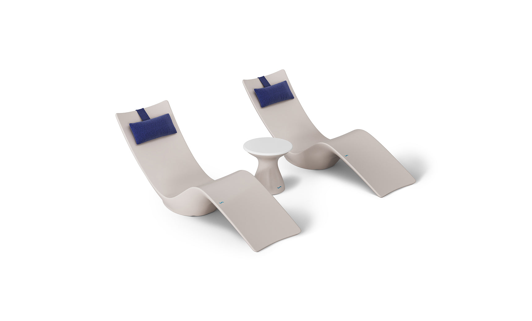Two beige chaise loungers with blue headrests and a small, round white table create a minimalist, stylish setup ideal for poolside relaxation. Enjoy this aesthetic with the Resort Luxury Outdoor Paradise In-Pool Furniture Bundle from Ledge Lounger.
