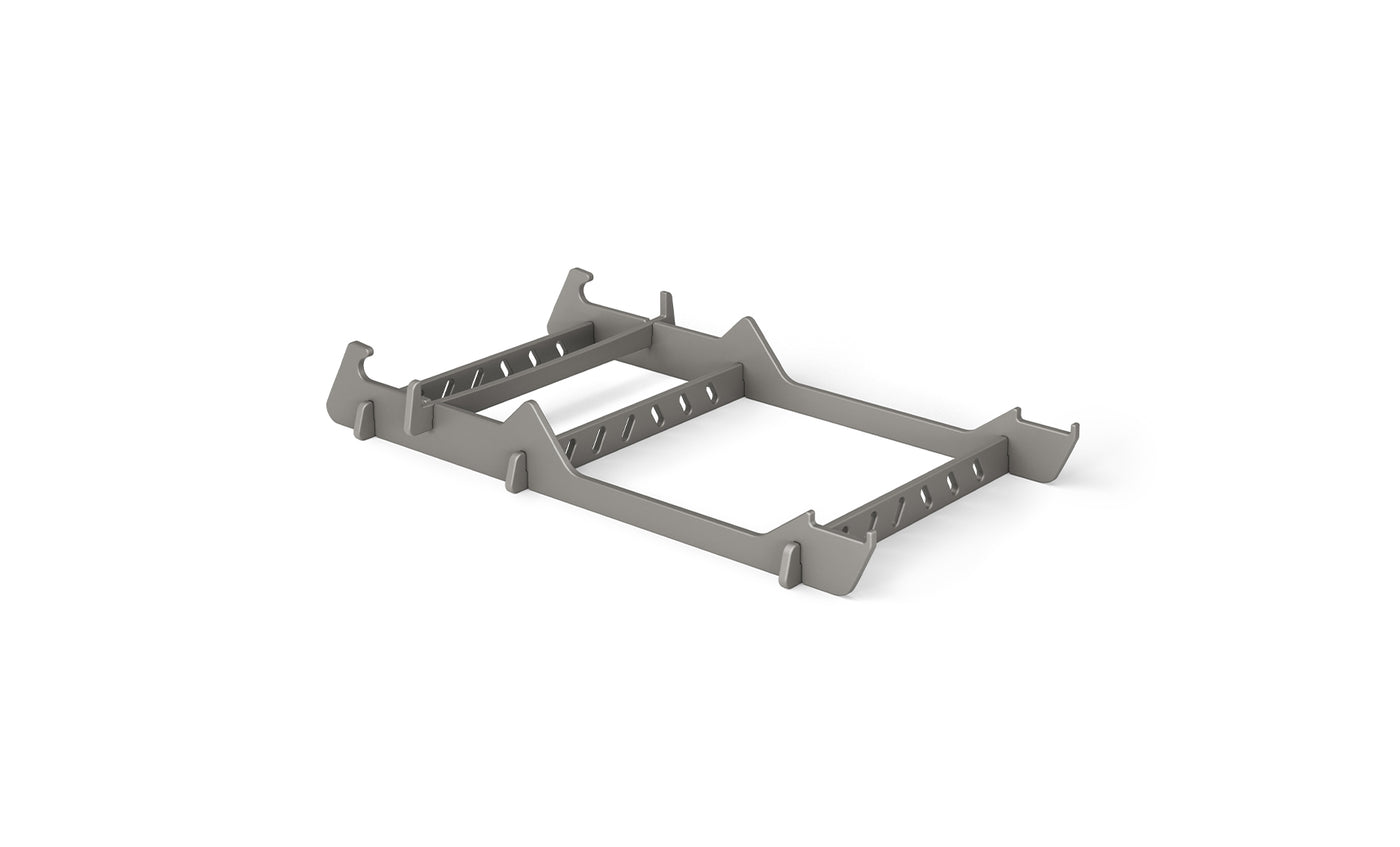 The Signature Chair Riser by Ledge Lounger is a gray, rectangular plastic rack with multiple slots and cut-out handles—ideal for in-pool seating or organizing essentials outdoors.