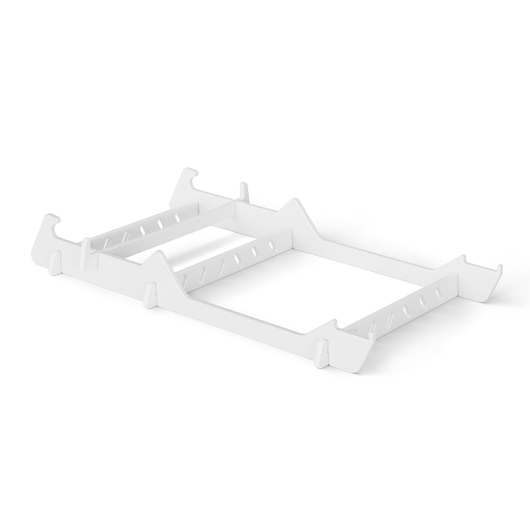 The Signature Chair Riser by Ledge Lounger is a white, rectangular collapsible plastic laptop stand with adjustable height settings, ideal for in-pool seats or outdoor day use, showcased against a plain white background.
