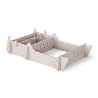 The Signature Chair Riser by Ledge Lounger features a beige color, adjustable design with interlocking panels and slotted sides. Its perfect for organizing outdoor essentials.