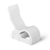 The Signature Chair With Medium Riser by Ledge Lounger is a modern white plastic lounge chair with a curved backrest and seat, perfect as an in-pool lounger for outdoor or poolside seating, shown on a plain white background.