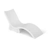 The Signature Chaise Riser by Ledge Lounger is a modern, sleek white lounge chair with a minimalist design, featuring a curved seat and backrest. Ideal as one of the in-pool seats or for enhancing any setting with its elegant presence against a plain white background. Perfect for outdoor days.