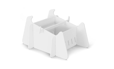 A white, minimalist, flat-pack organizer by Ledge Lounger with two compartments and rounded panels assembles from interlocking pieces—perfect for storing essentials on your Signature Chaise Deep Riser during outdoor days.