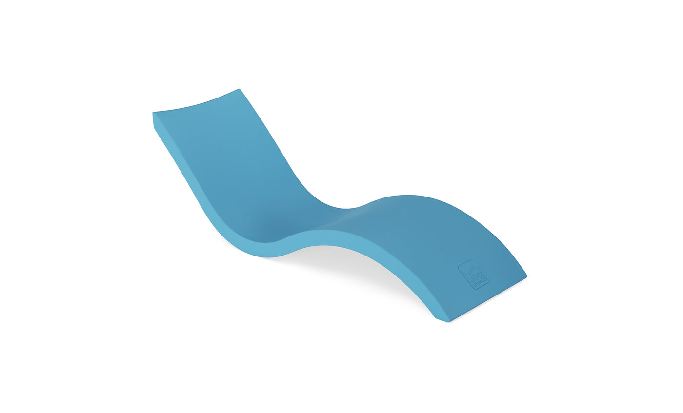 The Ledge Loungers Signature Chaise is a modern, blue lounger with a sleek S-curve and ergonomic design. Its smooth surface ensures comfort, perfect for poolside relaxation, and its minimalist style accentuates the lightweight feel.