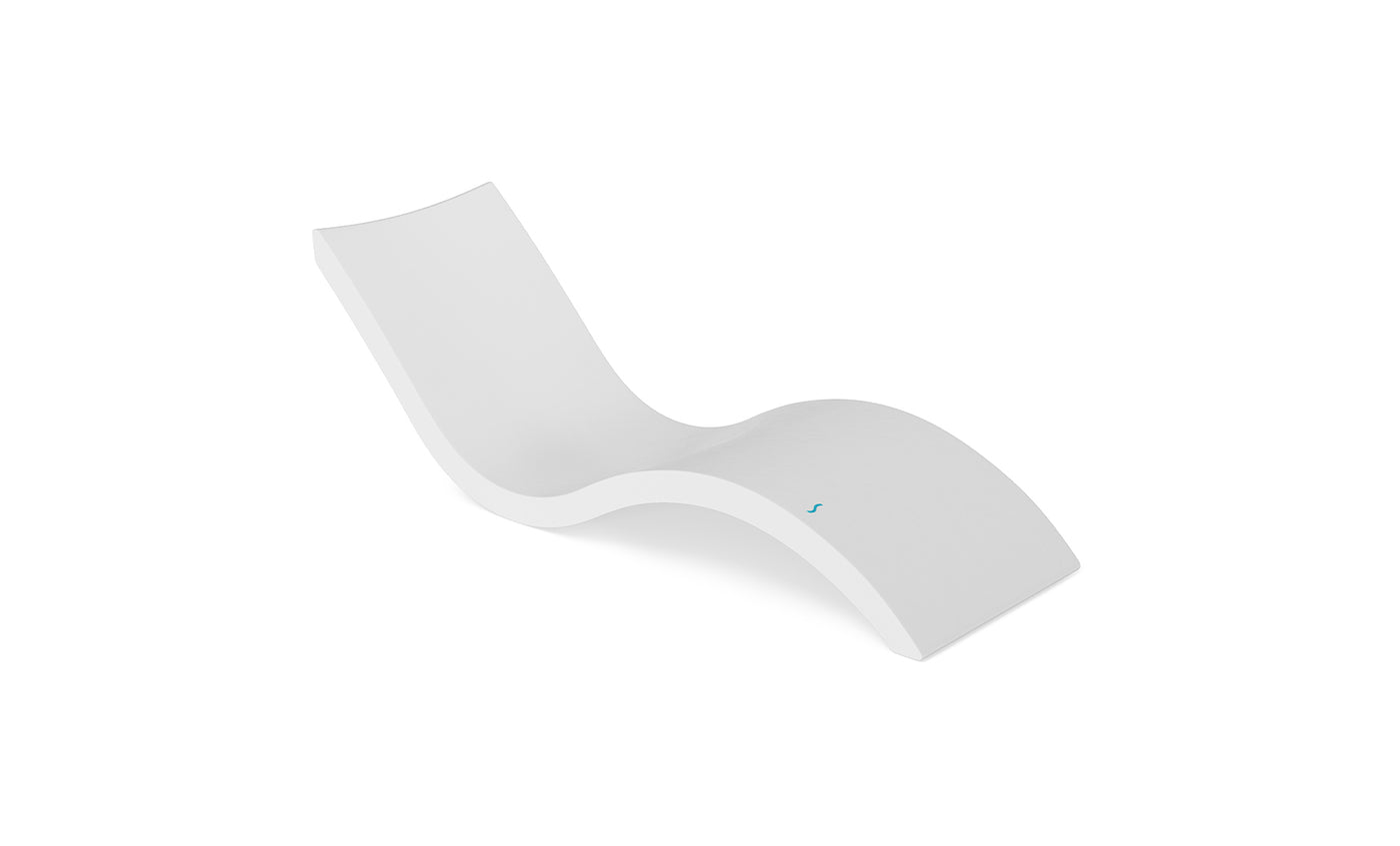 Relax poolside with the Signature Chaise by Ledge Lounger. This sleek, modern white lounger has an ergonomic S-shaped design with clean lines and a subtle blue seat accent, enhancing its minimalist style on a plain white background.