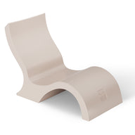 The Ledge Lounger Signature Lowback Chair With Short Riser is a modern beige S-shaped plastic lounge chair with a smooth, curved design and a logo embossed on the lower front—ideal as stylish poolside seating.