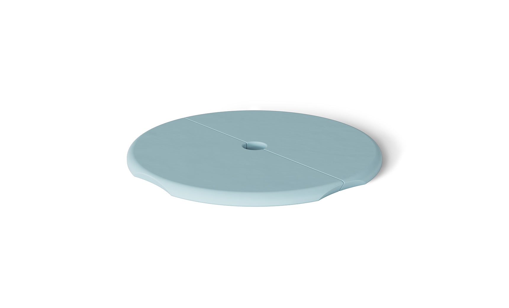 The Ledge Lounger Signature Side Table Lid with Umbrella Hole is round and light blue, featuring a flat surface and small central hole. Its ergonomic indents and shadows give it an elevated look, while UV resistance makes it ideal for poolside use.