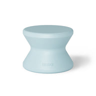 The BLEEGE light blue hourglass stool, with a wider top and bottom, offers sun shelf comfort. Its sleek surface makes it ideal for in-pool use, seamlessly blending style and functionality reminiscent of a Ledge Lounger Signature Standard Side Table.