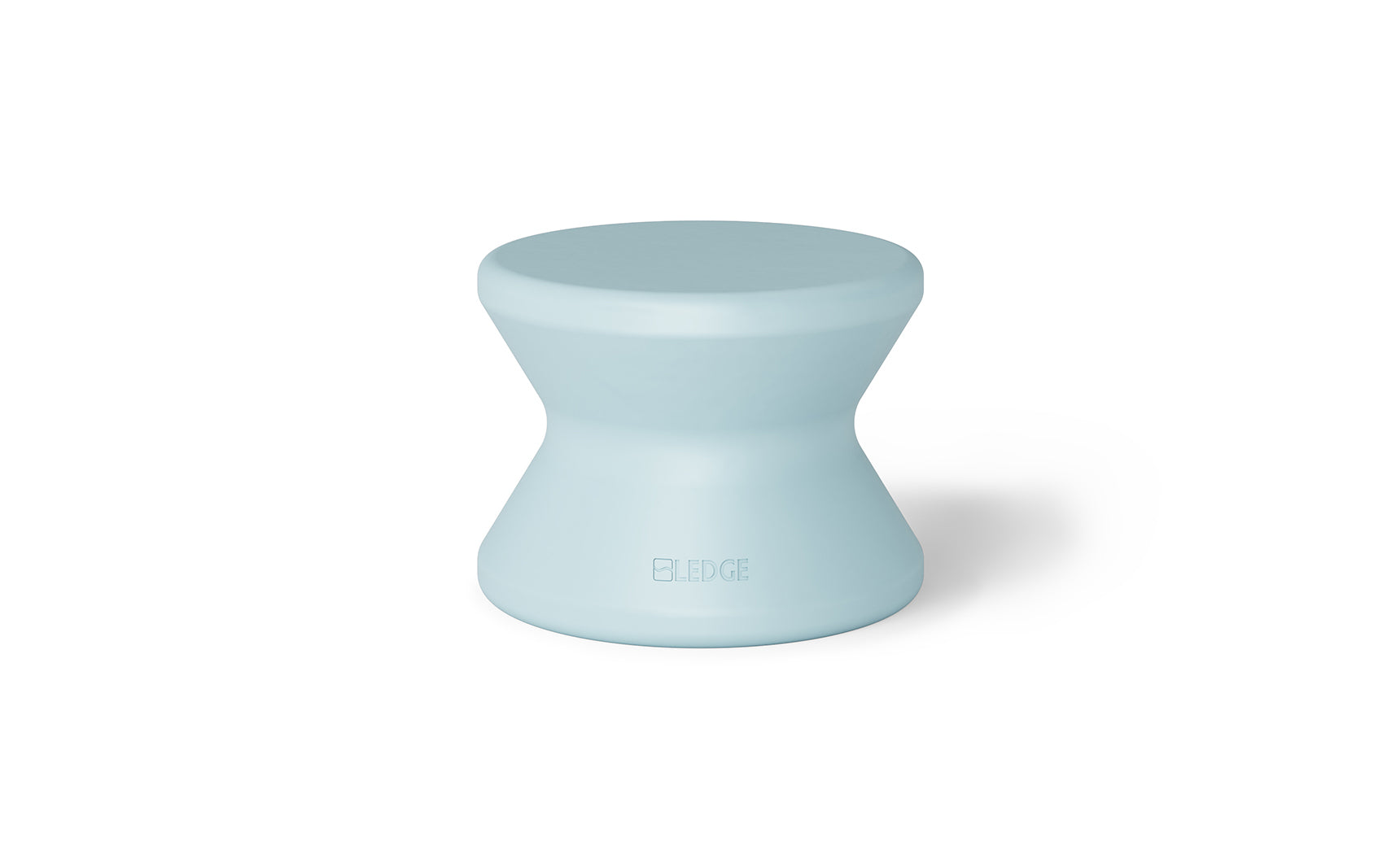 The BLEEGE light blue hourglass stool, with a wider top and bottom, offers sun shelf comfort. Its sleek surface makes it ideal for in-pool use, seamlessly blending style and functionality reminiscent of a Ledge Lounger Signature Standard Side Table.