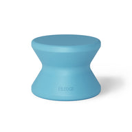 The Signature Standard Side Table by Ledge Lounger is a blue hourglass-shaped stool with a smooth finish, ideal for in-pool use. Its modern design features ELEDGE embossed near the base, making it perfect for a sun shelf.