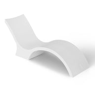 The Signature Chaise Deep by Ledge Lounger is a white, S-shaped modern chaise lounge featuring a smooth, minimalist design and gentle curve, perfect for lounging by the tanning ledge. Its sleek form against a plain background epitomizes elegant simplicity.