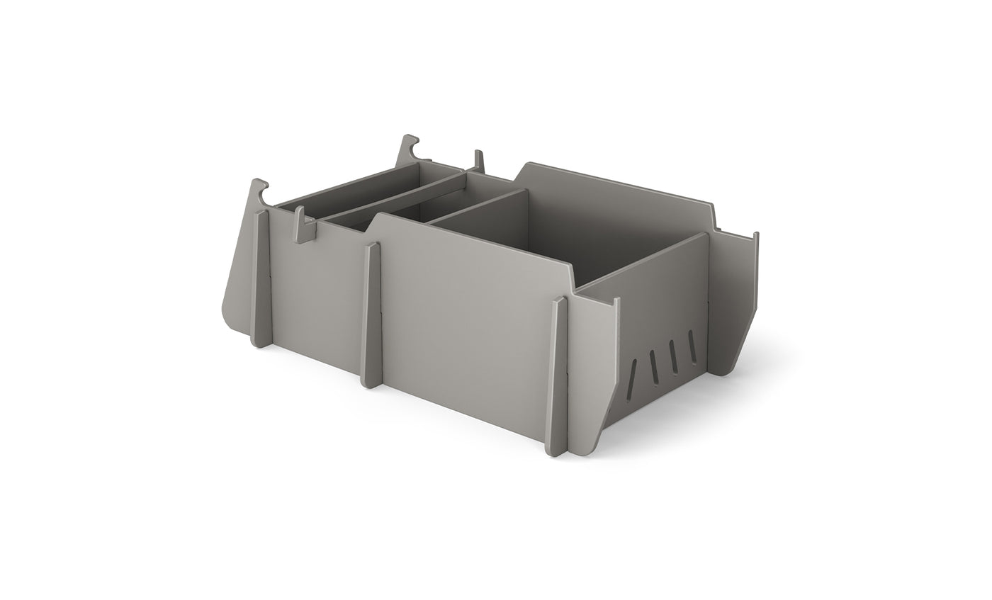 The Ledge Lounger Signature Lowback Chair With Tall Riser, a stylish grey seating option for outdoor spaces, is displayed on a plain white background.