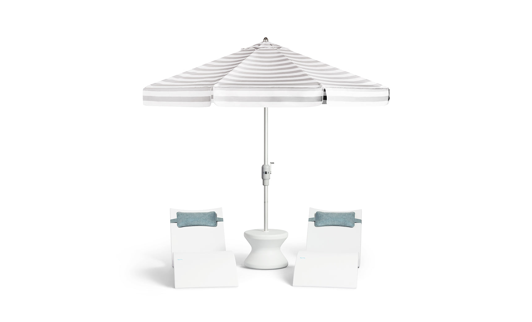 Two white lounge chairs with blue cushions flank a small white table, all shaded by the Ledge Lounger 7.5' Octagon Signature 360° Tilt Umbrella in classic white and gray stripes.