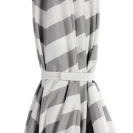 Gray and white chevron curtain gathered with a matching tieback adds elegance—perfect for pairing with the Ledge Lounger 8.5' Square Signature 360° Tilt Umbrella in luxury outdoor spaces.