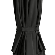 A close-up of Ledge Lounger's 8.5' Square Signature 360° Tilt Umbrella in black, neatly gathered with a fabric tieback against a white background, showcasing the elegance of luxury outdoor umbrellas.