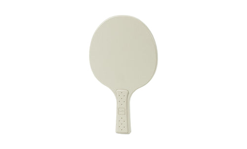 The Ledge Lounger Table Tennis Paddle, in beige with an oval surface and subtly textured handle, is displayed against a white background, evoking the classic style of a handheld mirror.