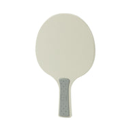 A beige Table Tennis Paddle by Ledge Lounger with an oval shape, light gray gripped handle, and dotted texture is displayed on a white background—perfect for any Ledge Table Tennis Set.