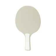 A table tennis paddle by Ledge Lounger is shown against a plain white background, featuring a beige plastic design with a textured oval surface and a short handle.