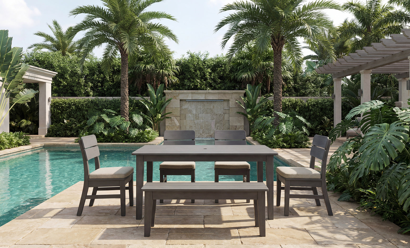 Transform your outdoor space with the Mainstay Dining 9-Piece Patio Set from Ledge Lounger. This elegant wooden set, featuring four chairs and a bench, is showcased poolside amid palm trees, lush greenery, and stylish stone paving under a partly cloudy sky. Perfect for al fresco gatherings or relaxing family meals, it blends durability and sophistication to elevate any patio setting.