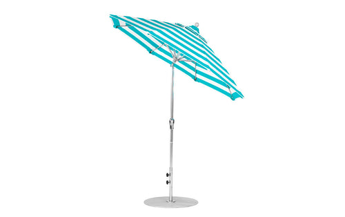 The Ledge Lounger Essential Fiberglass Umbrella is a 7.5 octagon umbrella crafted from blue and white marine-grade fabrics, boasting a sleek metal pole, round base, and wind resistance. It features a crank handle for auto-tilt adjustments, offering style and durability outdoors.