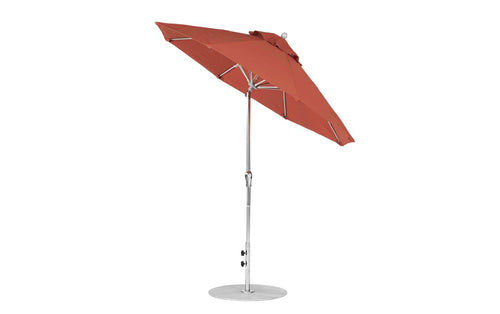 The Ledge Lounger Essential Fiberglass Umbrella features a 7.5 octagonal red canopy with a metal pole and silver round base. Its wind-resistant with durable marine-grade fabric and includes a crank for easy opening and tilting, adding style to any patio setting.