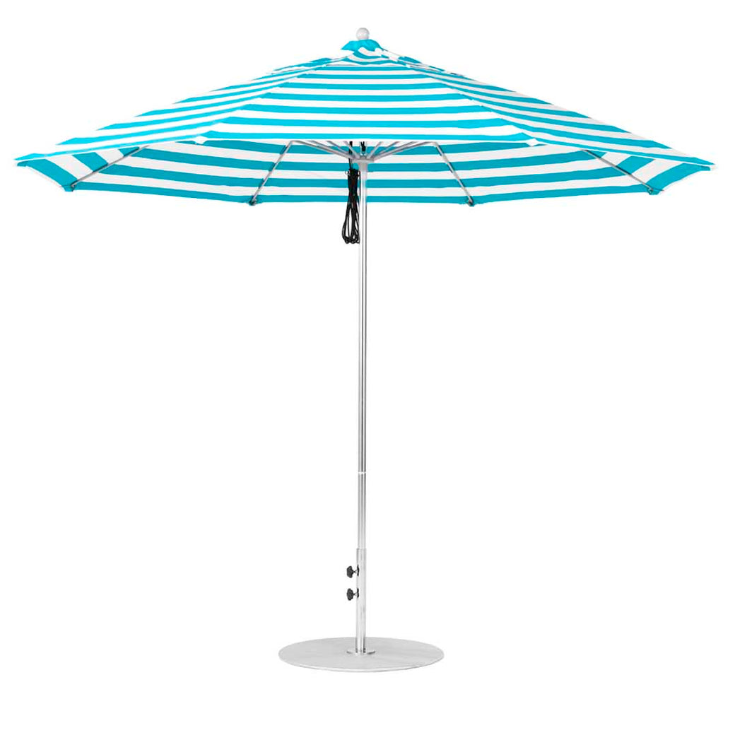 The Essential Fiberglass Umbrella by Ledge Lounger features a blue and white stripe design. This 11 octagon umbrella is wind-resistant with a metal pole for durability, standing open on a round base for stability.