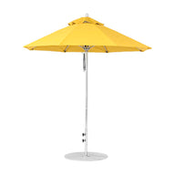 The Ledge Lounger Essential Fiberglass Umbrella features a vibrant yellow octagon canopy, supported by a sleek silver metal pole with a sturdy round base. Made from marine-grade fabrics, this 7.5-foot design is wind-resistant and exudes modern elegance against a plain background.