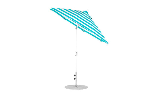 The Ledge Lounger Essential Fiberglass Umbrella, a 7.5 octagon crank auto tilt model, is shown slightly tilted against a white background, featuring blue and white stripes with a durable marine-grade fabric and metal pole with round base.