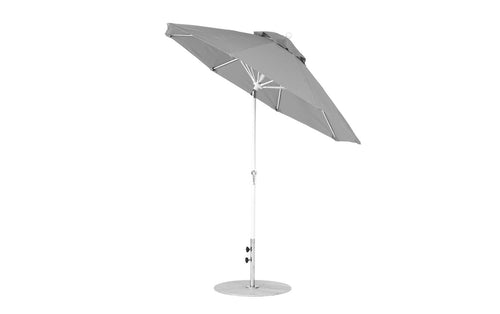 The Ledge Lounger Essential Fiberglass Umbrella, 7.5 octagon crank with auto tilt, is gray and wind-resistant. It features a large canopy attached to a metal pole with a round base and adjustment knobs for height or tilt, ensuring durability in any weather.