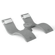 The Ledge Loungers modern U-shaped gray watch stand, featuring two cushioned holders, neatly displays watches with a sleek, minimalist design echoing their Outdoor Paradise In-Pool Furniture Bundle, adding a touch of sophistication to any space.