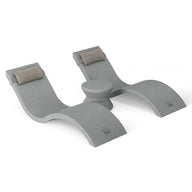 The Ledge Lounger Outdoor Paradise In-Pool Furniture Bundle includes a gray ergonomic yoga headstand bench with padded supports. Perfect for shoulder alignment during inversions, it complements in-pool chaise loungers and pool ledge furniture on a white backdrop.