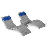 Gray ergonomic footrest with curved supports and blue fasteners; perfect for under-desk use. Transform your workspace comfort to an Outdoor Paradise In-Pool Furniture Bundle by Ledge Lounger.