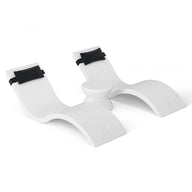The Ledge Lounger Outdoor Paradise In-Pool Furniture Bundle features a white, curved plastic bath kneeler with dual cushioned sections and a central grip, offering comfort and stability for knee support. Perfectly complements your pool ledge furniture for indoor or outdoor use.