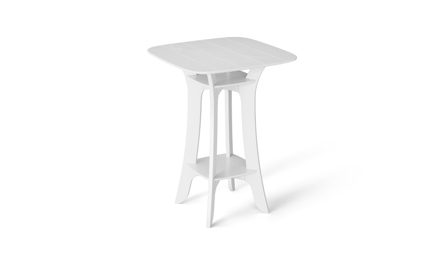 The Haven Hightop Table by Ledge Lounger features a minimalist design with a square white top and open central shelf, supported by four sleek, angled legs. Part of the patio collection, it complements any setting with its durable modern aesthetic against a plain white background.