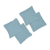 Four Ledge Lounger Bean Bags in light blue fabric are arranged in a loose cluster on a white background.