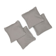 Four Ledge Lounger Bean Bags in light gray fabric are arranged in a scattered, overlapping pattern on a white background.
