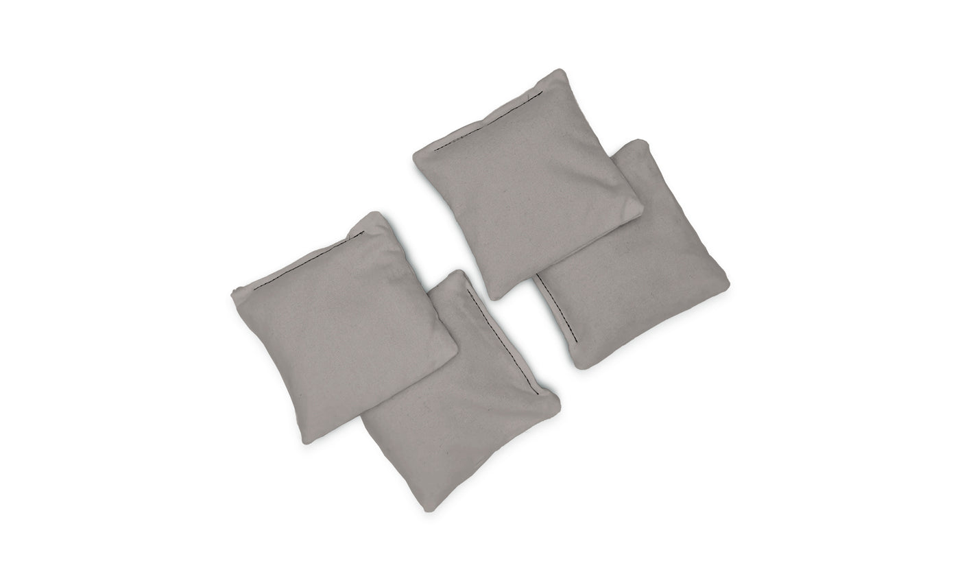 Four Ledge Lounger Bean Bags in light gray fabric are arranged in a scattered, overlapping pattern on a white background.