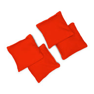 Four bright red Bean Bags by Ledge Lounger are arranged on a white background in two overlapping pairs, forming a slightly staggered grid pattern.