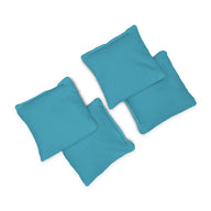 Four Ledge Lounger Bean Bags in blue fabric are arranged in a loose cluster on a white background.