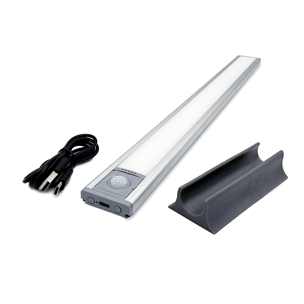 The Ledge Lounger Umbrella Light, with a gray end cap and black power cable, complements any outdoor setup. Its gray mounting bracket blends effortlessly against a white background, making it a perfect addition to your chic patio space.